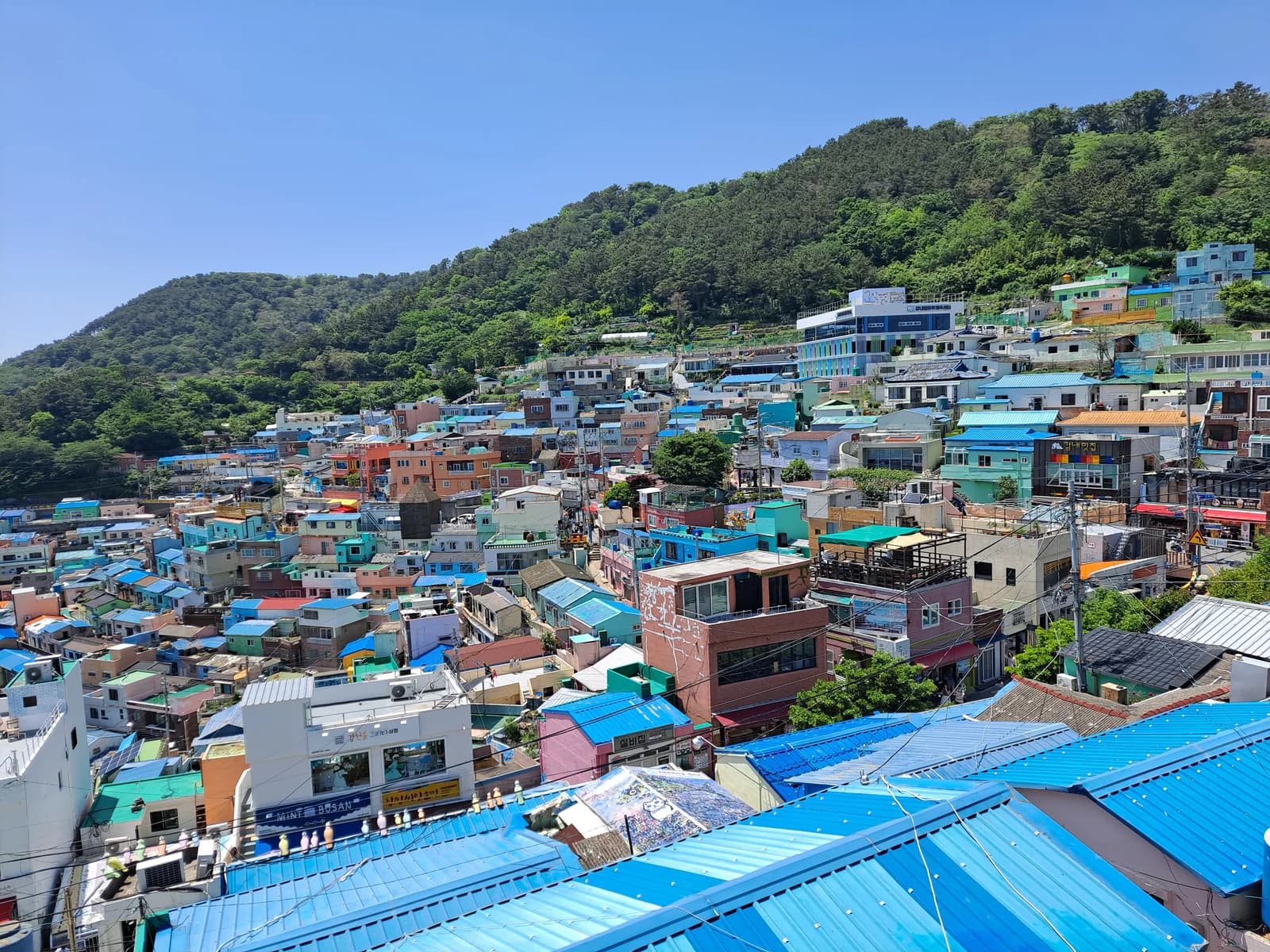 Gamcheon Culture Village today, the hillside neighborhood used in HERO’s Busan investigation. This is a location photograph, not a film still.